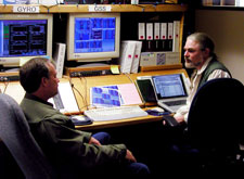 Two engineers,one from GP-B and the other from Lockheed Martin, discuss an anomaly in the MOC.
