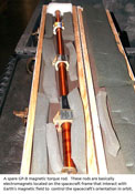 A spare magnetic torque rod, identical to those used on the spacecraft.