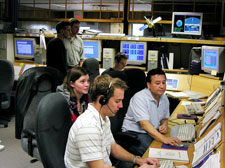 Members of the GP-B Mission Operations team upload commands to the spacecraft following the re-boot of a computer on-board the spacecraft.