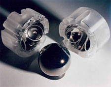 A gyro rotor and both halves of its quartz housing